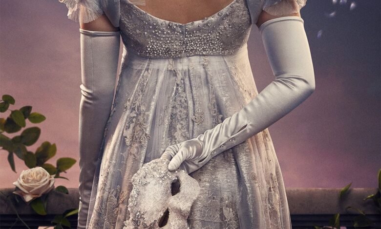 person in a white dress holding a mask