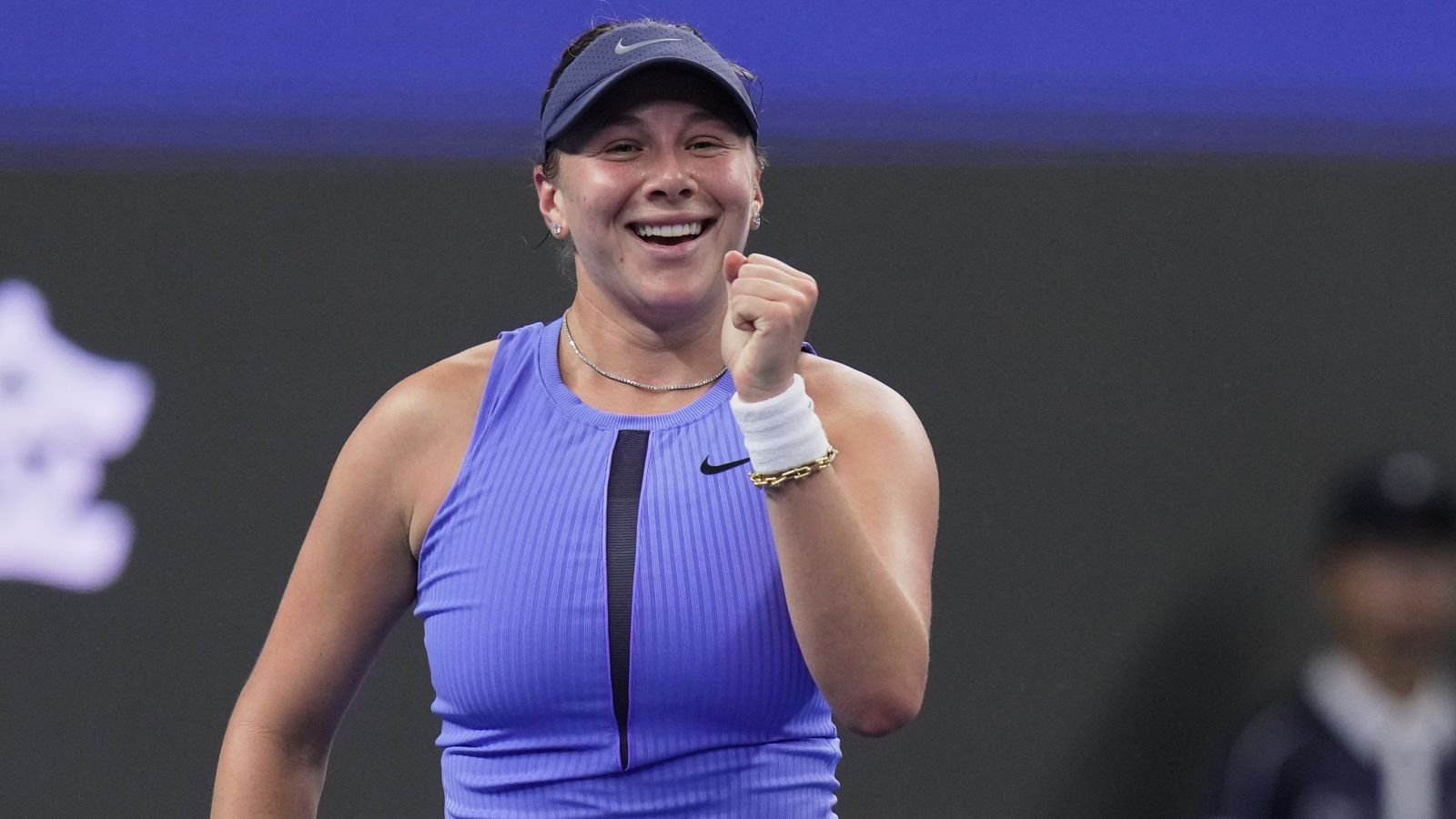 Amanda Anisimova, of the United States reacts after defeating Jasmine Paolini, of Italy in the women