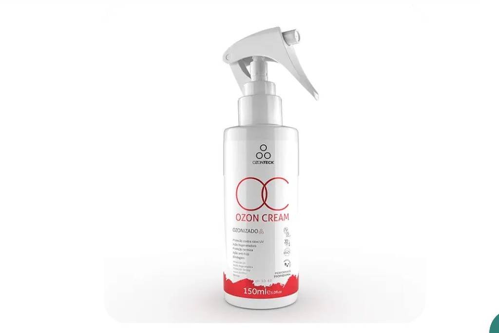 Frasco branco de 150 ml do creme Ozon Cream com aplicador spray na cor branca. Rótulo apresenta texto em vermelho e preto, incluindo o nome do produto e volume.